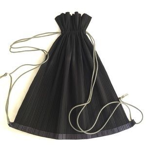 Issey Miyake black pleated drawstring backpack